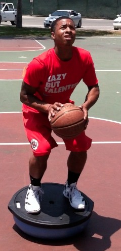 Private instruction — balance and ball handling on Bosu ball