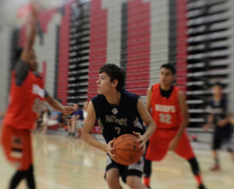 Game action — Warriors player driving