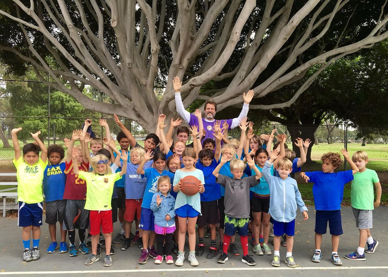 Playground Legends clinic — group under the tree